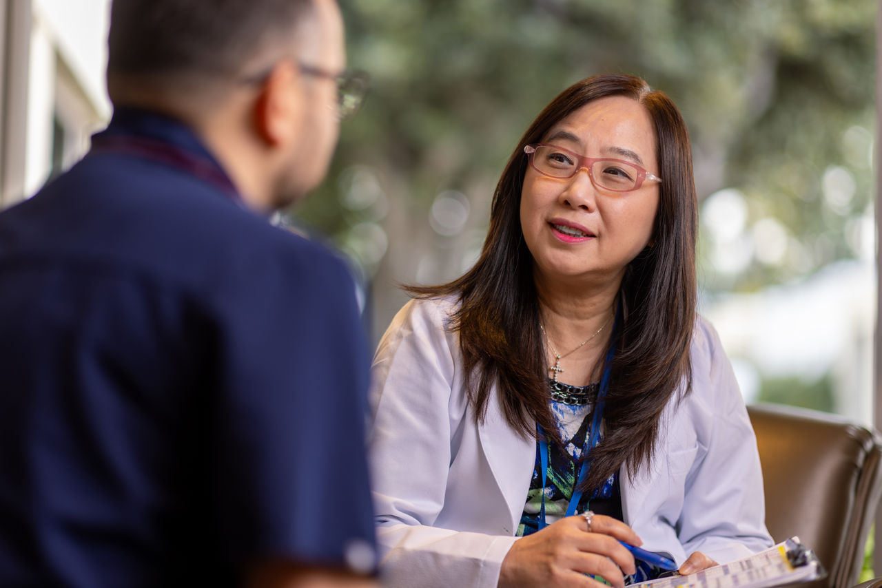 Clinician and patient talking